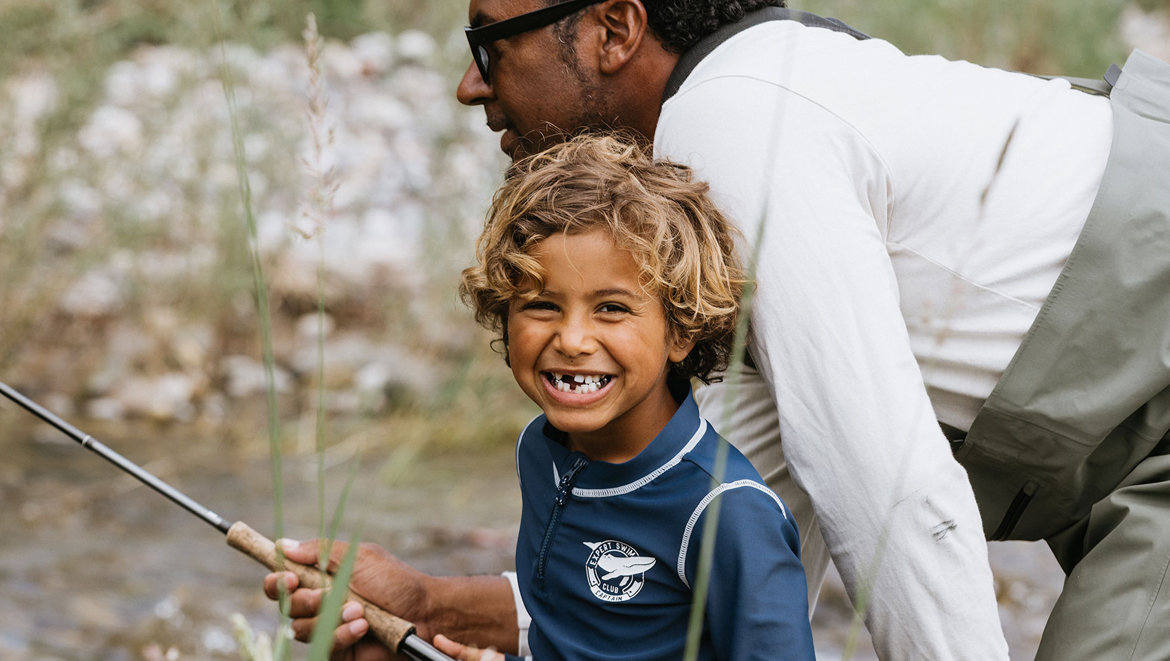 a father and son fly fishing