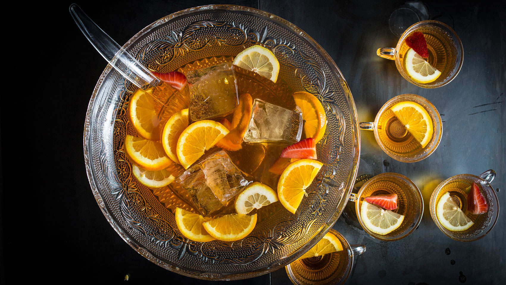 batch cocktail in a punch bowl