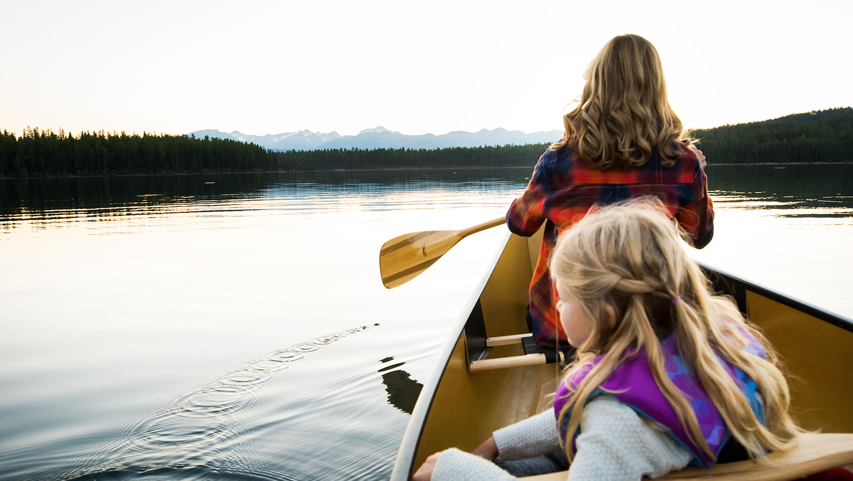 mother and daughter in canoe